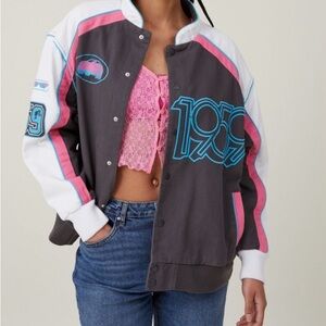 Barbie Moto Jacket with detailed patches. Size medium. Oversized. Sold out.